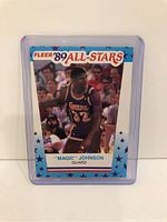 Front view of 1989 Fleer '89 All-Stars Magic Johnson basketball card in clear protective case showing Magic Johnson in Lakers uniform.