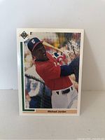Front view of 1991 Upper Deck SP1 Michael Jordan baseball card showing him in batting stance wearing a Chicago White Sox uniform.