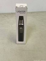 Front view of lighter smoking set box showing image of lighter and text 'LIGHTER SMOKING SET'