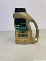 Front view of Scotts Ezseed 1.7 kg container showing product name and usage details