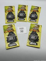 Photo showing 5 Black Ice air fresheners in original yellow packaging with fruit illustrations.