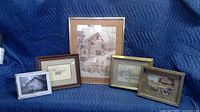 Five farmhouse themed framed prints arranged on a blue quilted background, showing size and style variations.