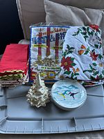 Vintage Christmas tree lighter/ashtray with gold accents, linens and appetizer plates for holiday entertaining.