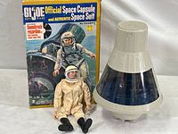 Box art showing GI Joe Official Space Capsule and Space Suit, with assembled capsule, cloth suit worn by figure, and GI Joe figure.
