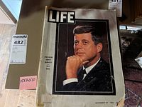 Full front cover of Life magazine with image of President John F. Kennedy looking contemplative, dated November 29, 1963.