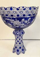 Full front view of footed centerpiece showing bowl and pedestal