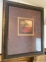 Front view of framed artwork showing overall design