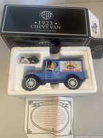 Die-cast van, Sylvester figure, paperwork in foam tray, box lid nearby