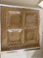 platter inside box showing four sections and texture