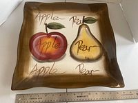 Top view showing fruit design and wavy rim