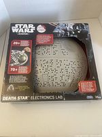 Front of boxed Star Wars Science Death Star Electronics Lab showing product and features