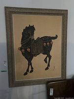 Full view of framed painting showing overall design and condition