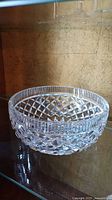 Side view of the crystal bowl showing diamond cut pattern and round shape