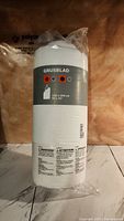 Photo of Ikea GRUSBLAD duvet packaged in clear plastic sleeve, label showing size 150 x 200 cm and product details.