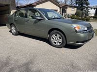 Front passenger-side quarter view showing exterior paint and wheel design