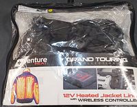 Front of packaged Venture Heat Grand Touring 12V heated jacket liner, size XL, with wireless controller.