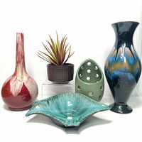 Front view of all five pottery items together showing shapes, colors, and finishes