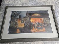 Full view of framed 'King of the Road' print showing artwork, mat, and frame