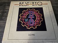 Front cover of The Best of B.T.O. vinyl album showing title, BTO logo artwork, and autograph.