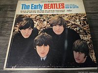 Front cover of The Early Beatles vinyl album showing the four members of The Beatles in color photo with album title and Capitol Records branding.