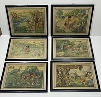 Full set of six framed lithograph prints arranged on a white surface, showing various prehistoric golf scenes by Walter R Duff.
