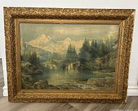 Full view of the antique framed landscape print by Thomas Moran showing mountainous nature scene and ornate frame.