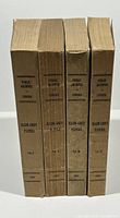 Four vintage softcover volumes of The Elgin-Grey Papers standing upright showing spine titles and publishing year 1937.