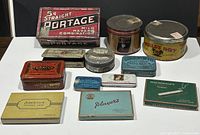 Full view of all 12 vintage tobacco tins, showing condition, sizes, and designs for the collection.