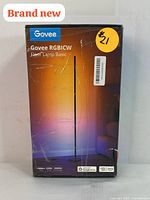Photo of boxed Govee RGBICW Floor Lamp showing product branding and key specifications such as 1000 lumens, 2200 kelvin color temperature, and 25,000 hour LED lifespan.