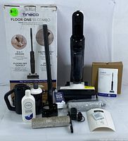 Image showing the Tineco FLOOR ONE S5 Combo main unit, roller brushes, cleaning solution bottle, charger, user manual, and original product box.
