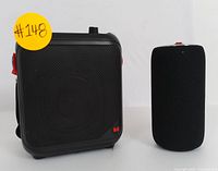 Front view of Monster MFS1 and Monster SuperStar S310 showing size difference and design