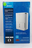 Box showing 50 pints per day capacity, Energy Star certification, R32 refrigerant, and model number MAD50CIAWS with branding and multilingual labels.