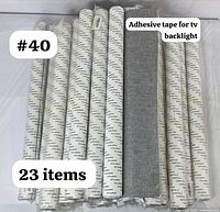 23 rolls of adhesive tape for TV backlight or strip lighting projects shown together, all individually wrapped.