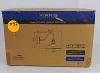 Box of VIANIS dusk to dawn outdoor wall lamp showing model and basic specifications.
