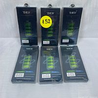 Six boxed replacement batteries for iPhone X, each with visible model and capacity labels on packaging.