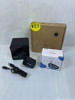 Bundle displayed with Petcube camera, Dogrook anti-bark collar box, and pet fountain box.