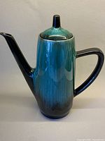 Full view of Blue Mountain Pottery pot with lid, spout and handle