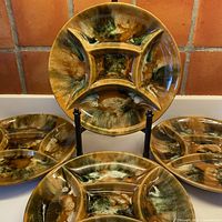 All four divided plates displayed, showing glaze pattern and divisions