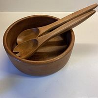 Bowl with spoon and fork nested inside