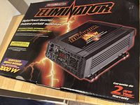 Front of product box showing MotoMaster Eliminator power inverter branding and 2000W output capacity.
