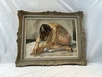 Full front view of framed oil painting depicting seated nude figure