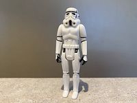 Front-facing image of vintage 1977 Kenner Star Wars Stormtrooper action figure showing full body and detailing.