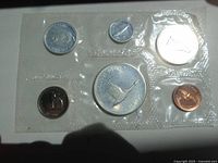 Photo showing all six 1967 Canadian coins sealed in original Royal Canadian Mint plastic packaging.