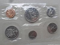 Photo of 1972 Canadian Mint coin set in original sealed plastic packaging, showing all six coins.