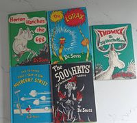 Photo of five Dr. Seuss hardcover books showing title and cover art: Horton Hatches the Egg, The Lorax, Thidwick the Big-Hearted Moose, And To Think That I Saw It On Mulberry Street, and The 500 Hats of Bartholomew Cubbins.