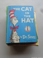 Front cover of The Cat in the Hat hardcover book by Dr. Seuss showing blue cover with character illustration.