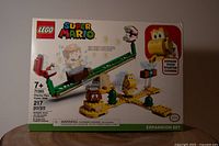 Front view of the Lego Super Mario Piranha Plant Power Slide Expansion Set box showing age recommendation, piece count, and characters.