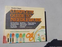 Image of Reader's Digest Complete Guide to Needlework book showing embroidery tools and floral pattern on cover.