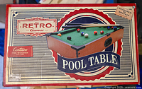 Front of box showing Retro Games Table Top Pool Table with classic design, green felt surface and set of balls