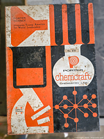 Top view of original Porter Chemcraft Lab #610 box showing vintage graphics with orange, black, and white colors and safety approved label.